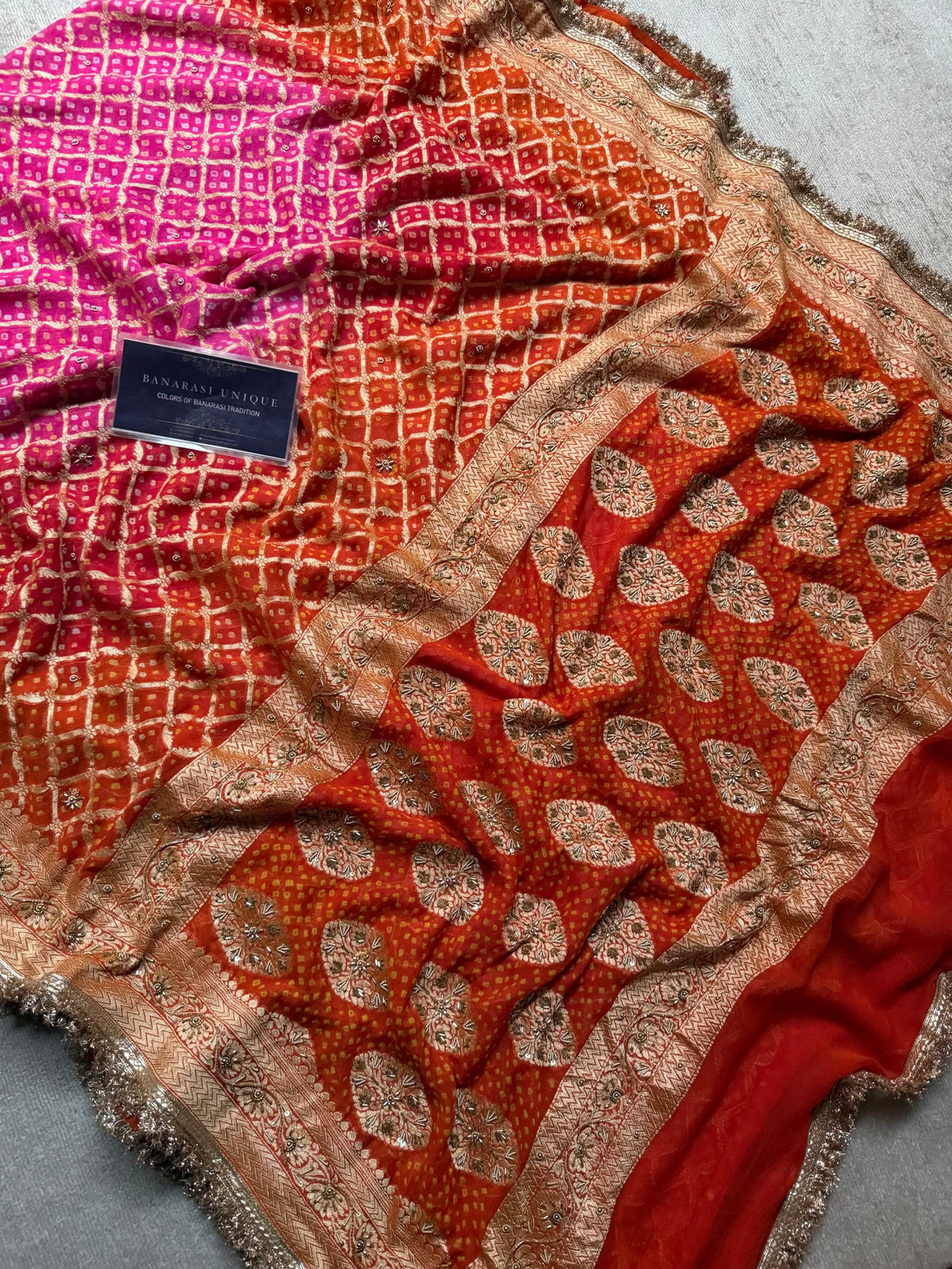 Pure Banarasi Khaddi Georgette Handmade Rai Dana Bandhej Saree in Dual Shade Orange & Pink with Zardozi Hand Embroidery