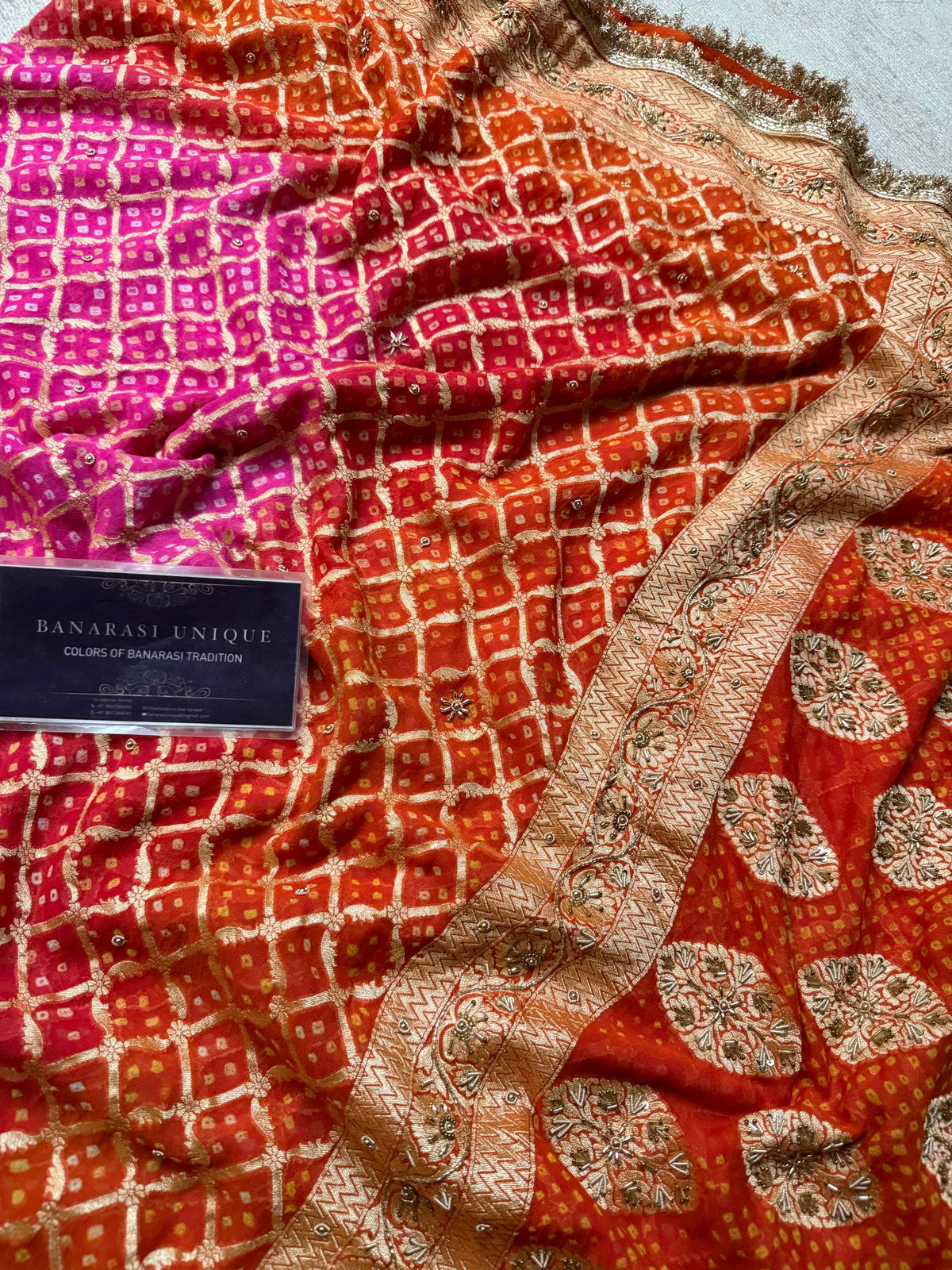 Pure Banarasi Khaddi Georgette Handmade Rai Dana Bandhej Saree in Dual Shade Orange & Pink with Zardozi Hand Embroidery