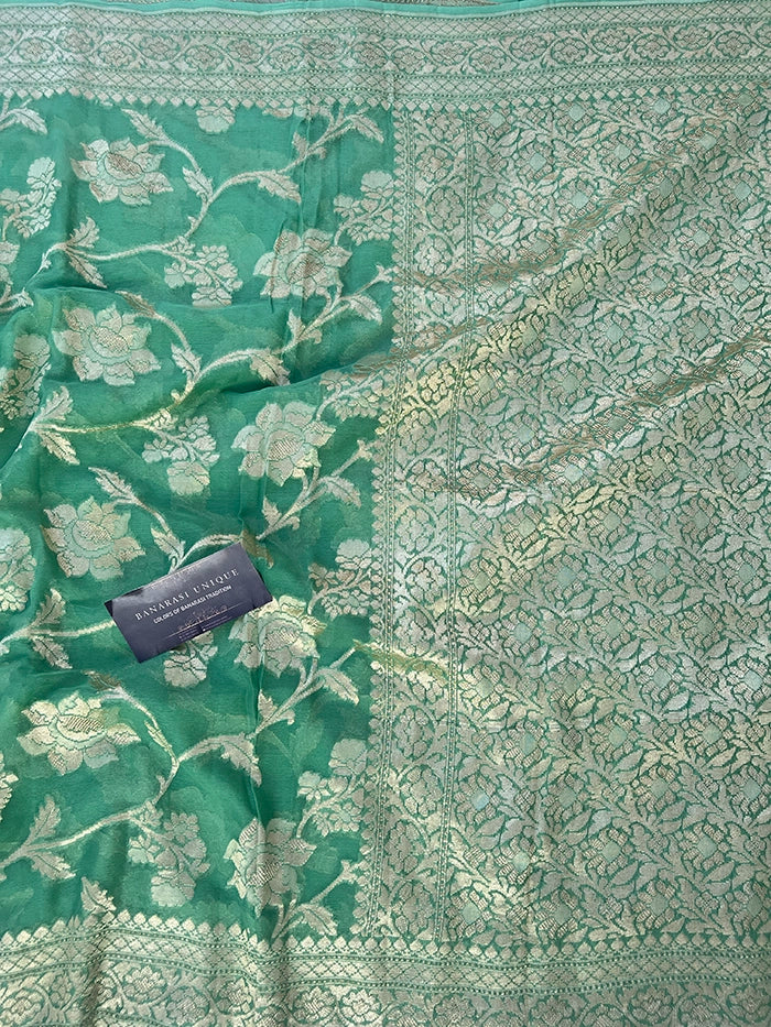 KHADDI GEORGETTE BIG FLORAL JAAL WATER ZARI SAREE - SAGE GREEN