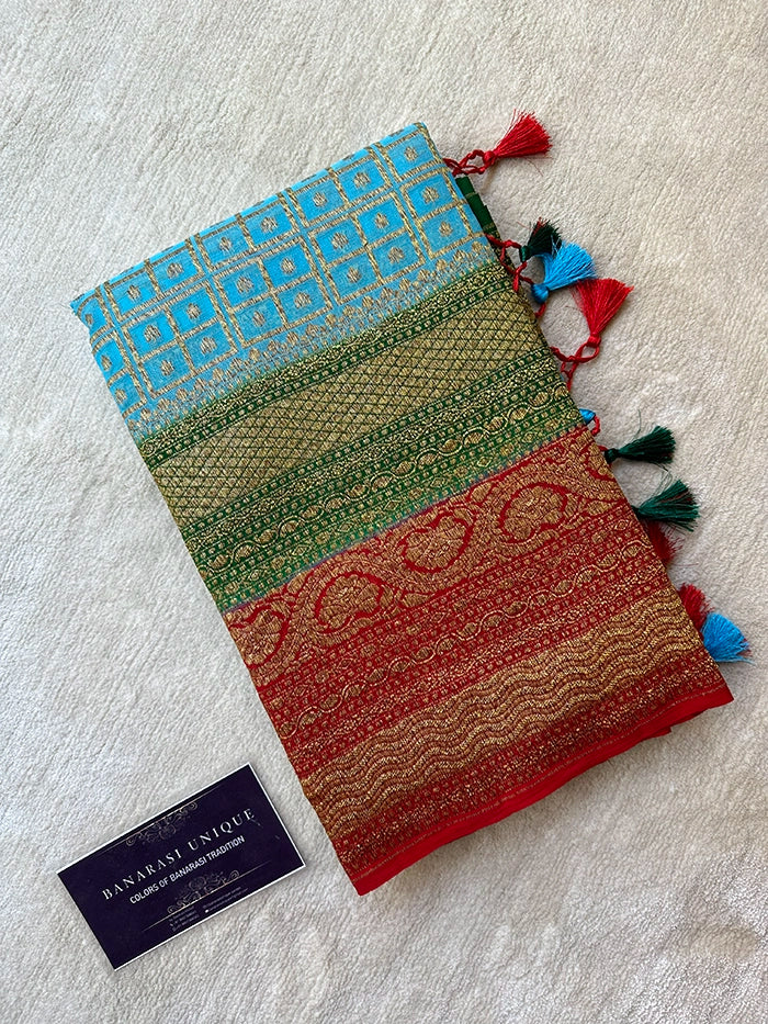 KHADDI GEORGETTE MULTICOLOUR 3D SAREE - SKY BLUE BODY RED BORDER