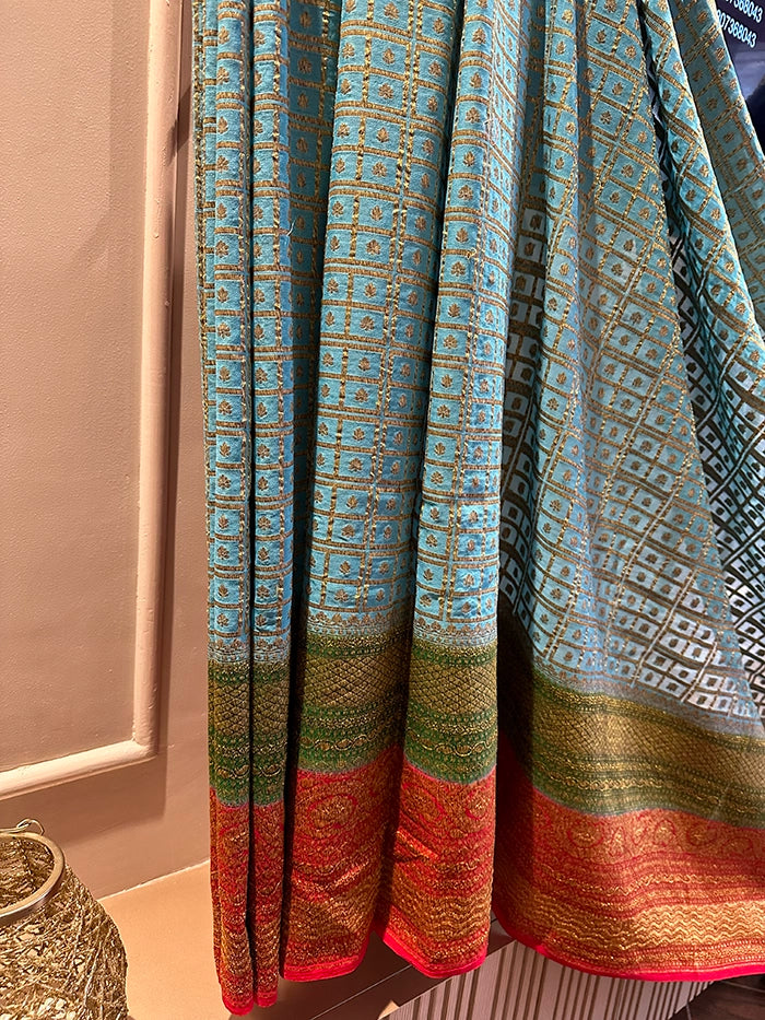 KHADDI GEORGETTE MULTICOLOUR 3D SAREE - SKY BLUE BODY RED BORDER