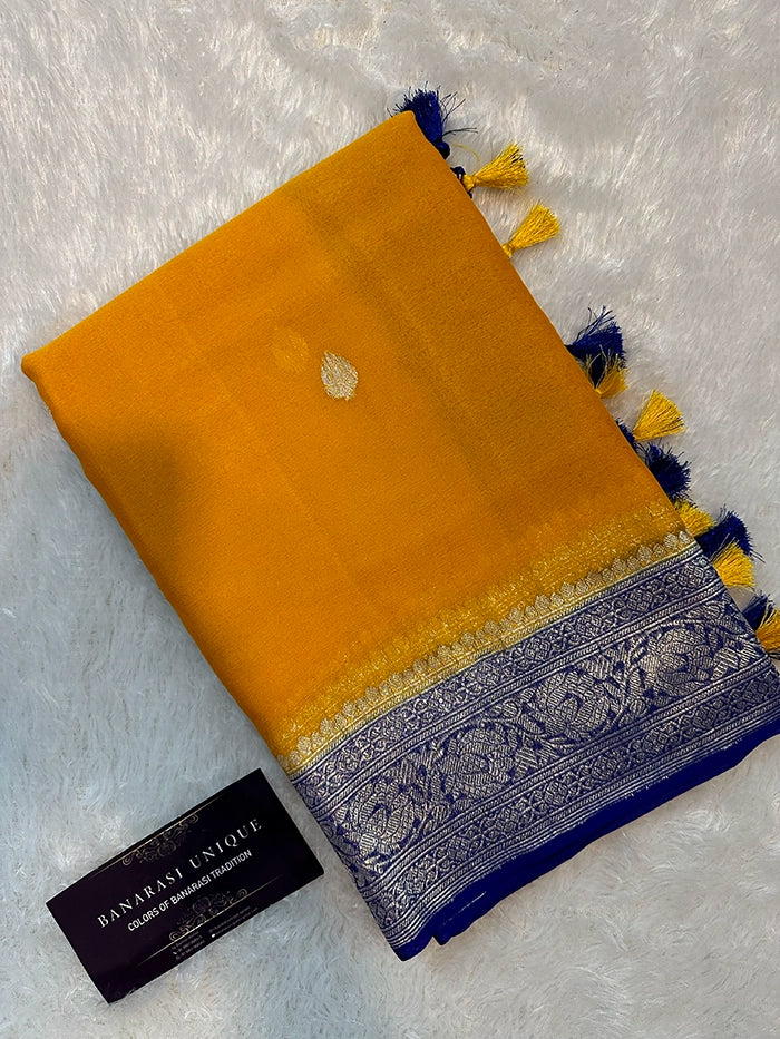 KHADDI CHIFFON SILVER ZARI KADHUWA SAREE - CONTRAST BORDER MUSTARD WITH NAVY BLUE
