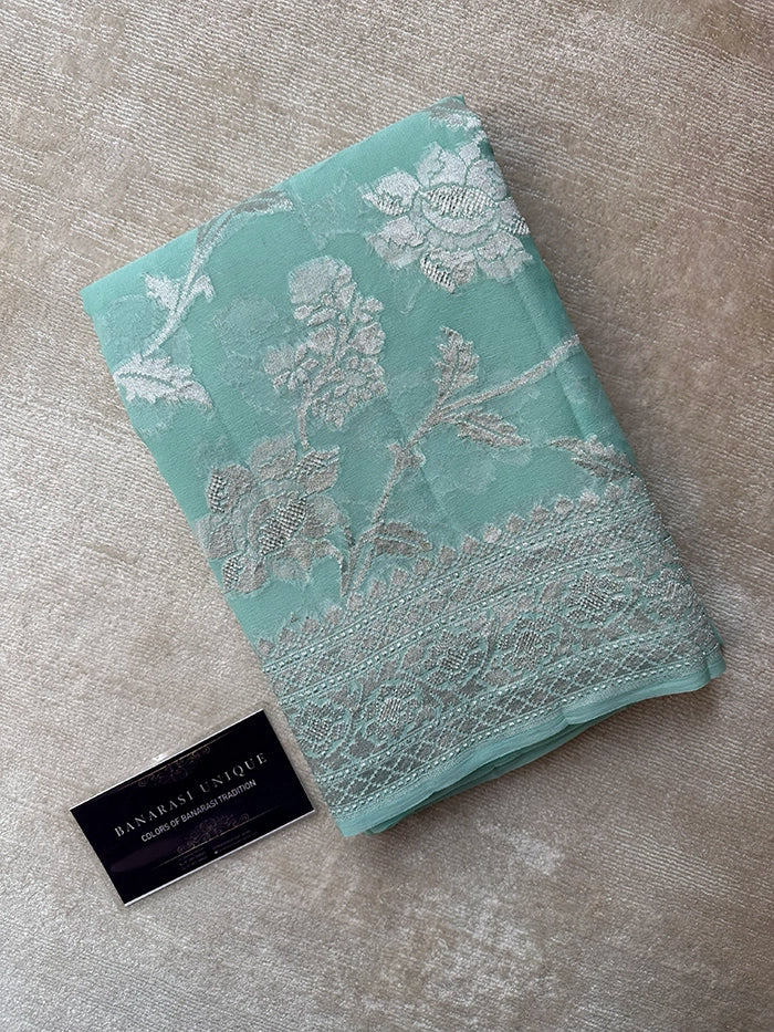 KHADDI GEORGETTE BIG FLORAL JAAL WATER ZARI SAREE - POWDER BLUE