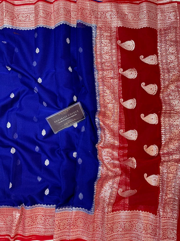 KHADDI CHIFFON SILVER ZARI KADHUWA SAREE - CONTRAST BORDER ROYAL BLUE WITH RED