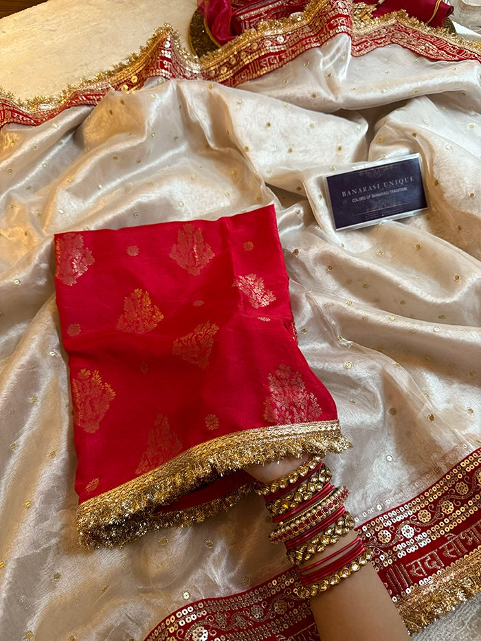 SAUBHAGYAWATI HAND EMBROIDERED TISSUE SAREE - SILVER WHITE with RED BORDER