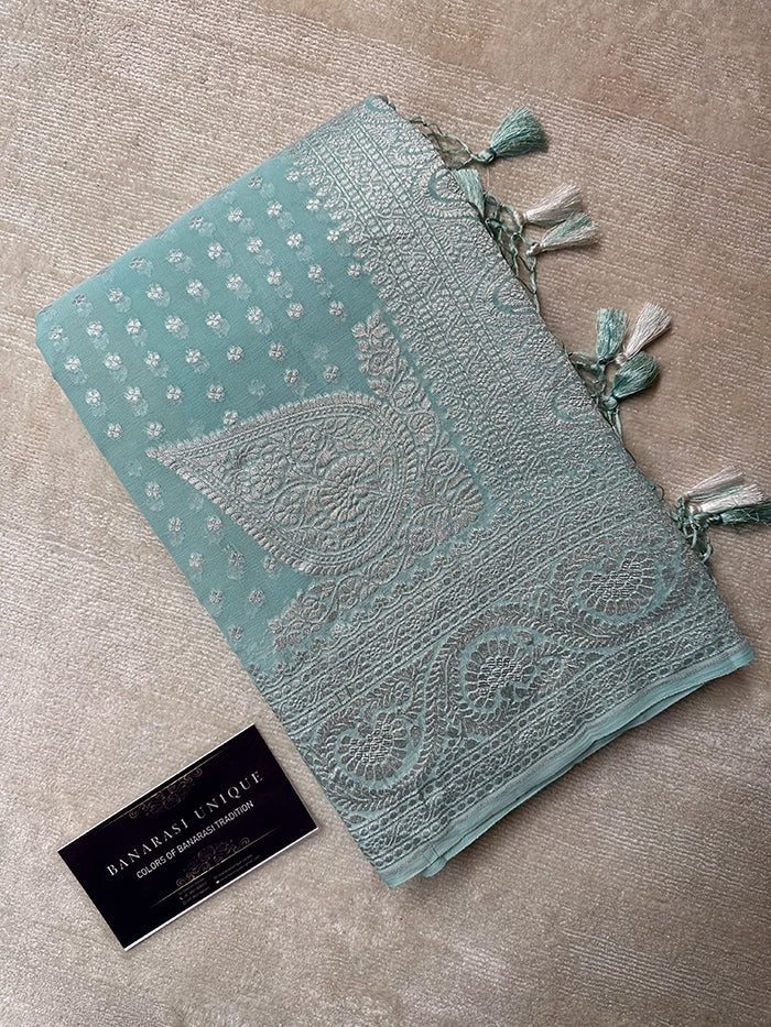 KHADDI GEORGETTE KONIA FOUR-PETAL BUTI SILVER ZARI SAREE - POWDER BLUE
