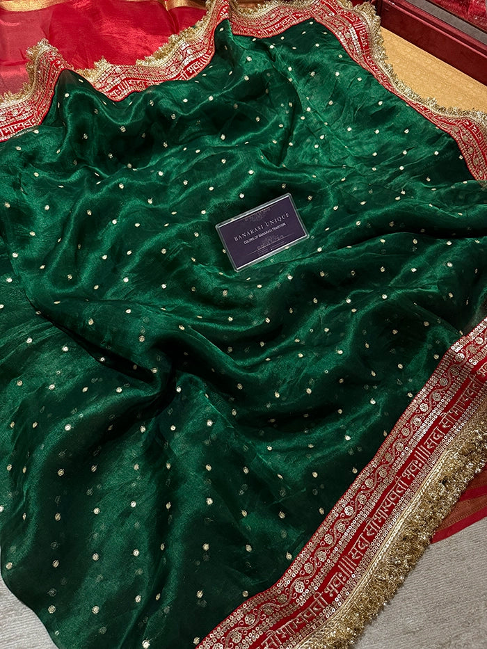 SAUBHAGYAWATI HAND EMBROIDERED TISSUE SAREE - BOTTLE GREEN with RED BORDER