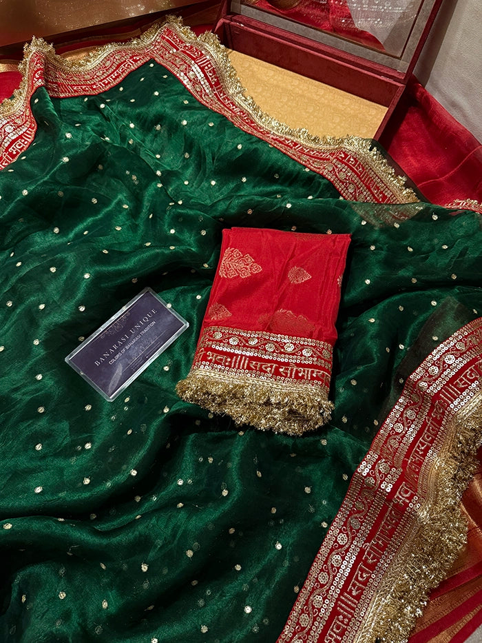 SAUBHAGYAWATI HAND EMBROIDERED TISSUE SAREE - BOTTLE GREEN with RED BORDER