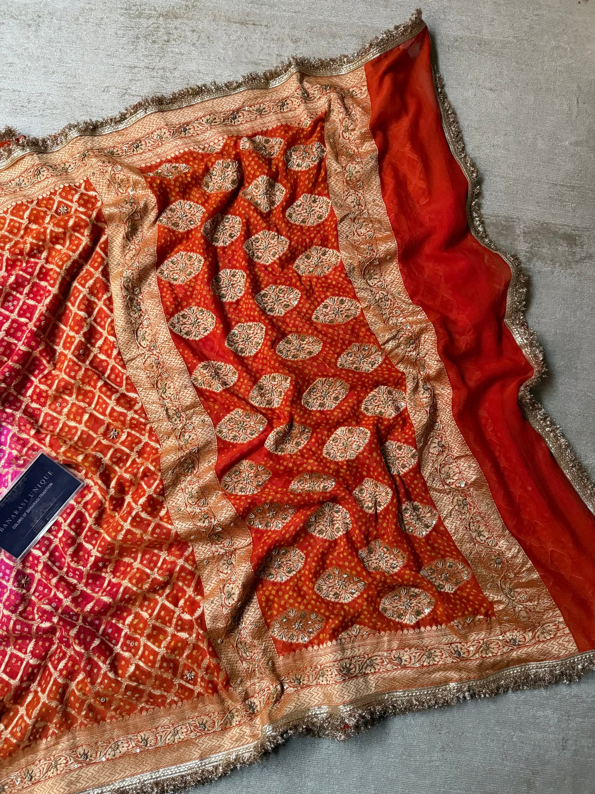 Pure Banarasi Khaddi Georgette Handmade Rai Dana Bandhej Saree in Dual Shade Orange & Pink with Zardozi Hand Embroidery