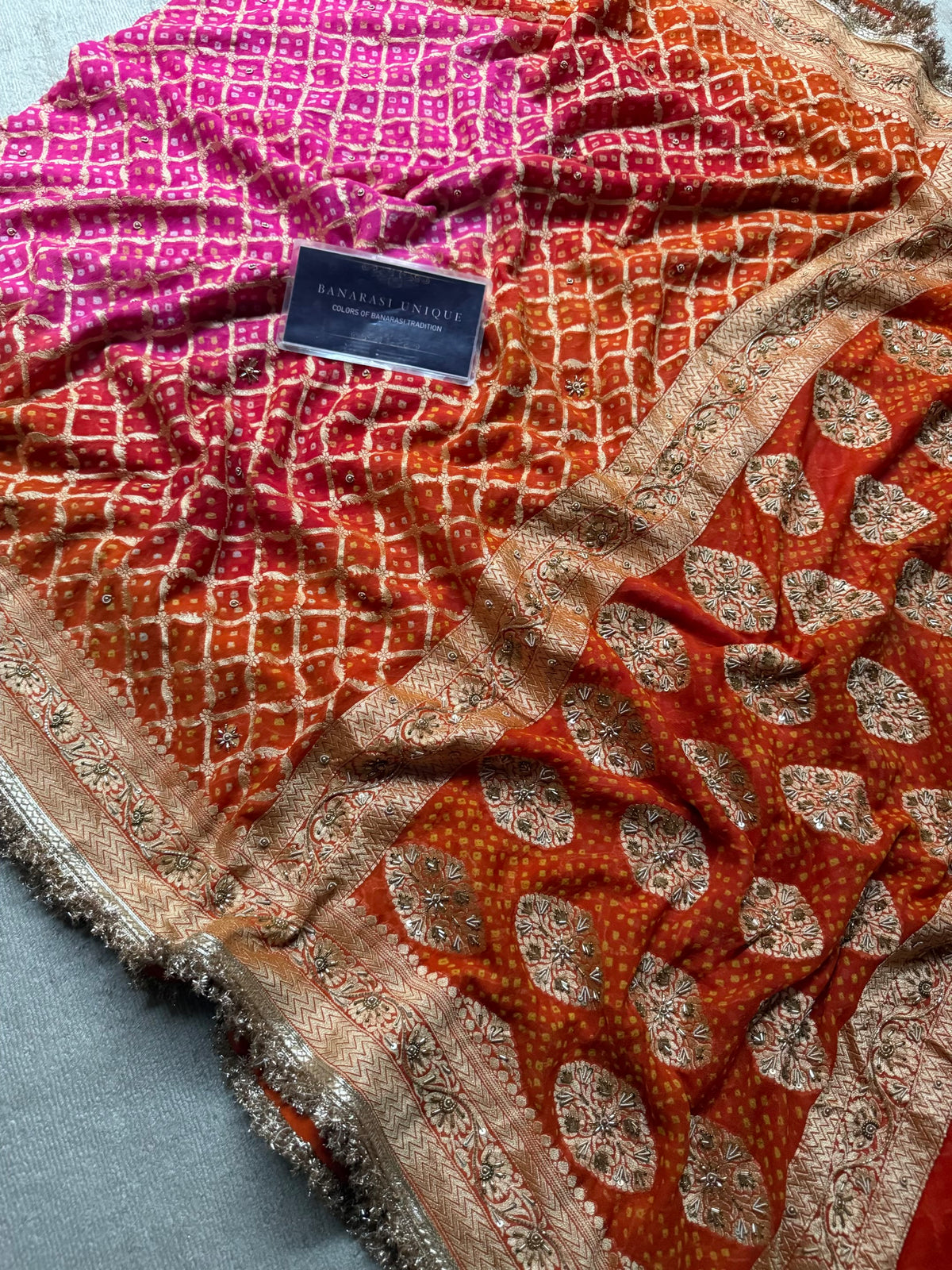 Pure Banarasi Khaddi Georgette Handmade Rai Dana Bandhej Saree in Dual Shade Orange & Pink with Zardozi Hand Embroidery