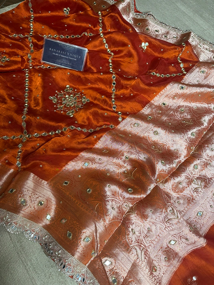 PURE TISSUE SILK MIRROR FLORAL BUTA AND JAAL SAREE - RUST ORANGE