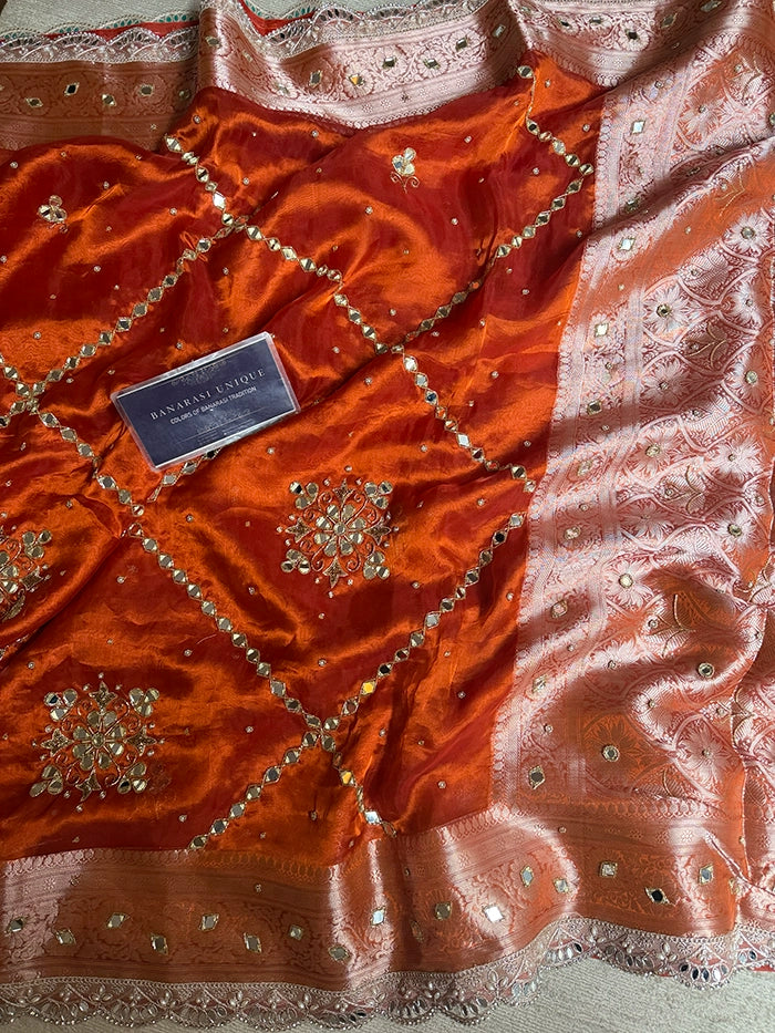 PURE TISSUE SILK MIRROR FLORAL BUTA AND JAAL SAREE - RUST ORANGE