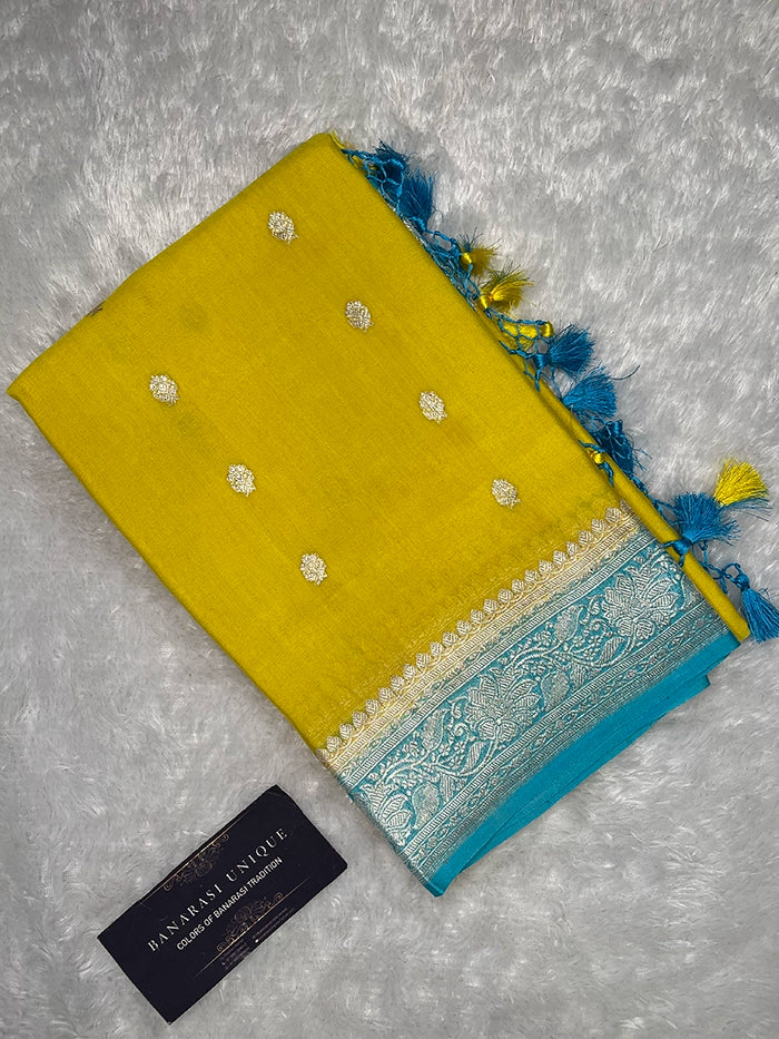 KHADDI CHIFFON SILVER ZARI KADHUWA SAREE - CONTRAST BORDER YELLOW WITH SEA BLUE