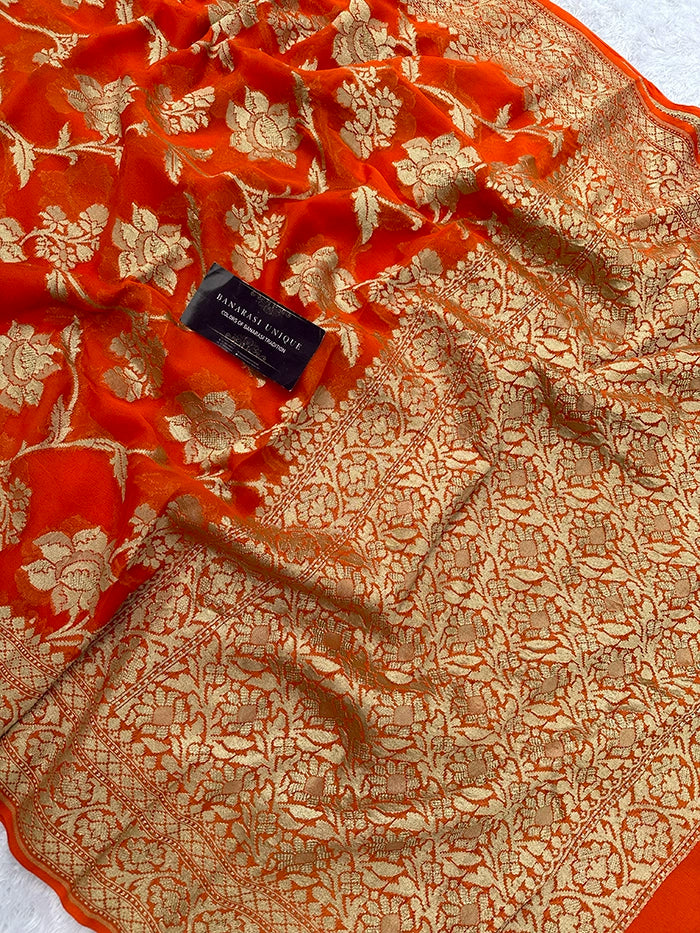 KHADDI GEORGETTE BIG FLORAL JAAL WATER ZARI SAREE - ORANGE