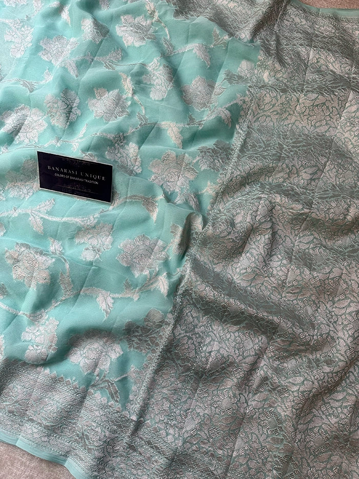 KHADDI GEORGETTE BIG FLORAL JAAL WATER ZARI SAREE - POWDER BLUE