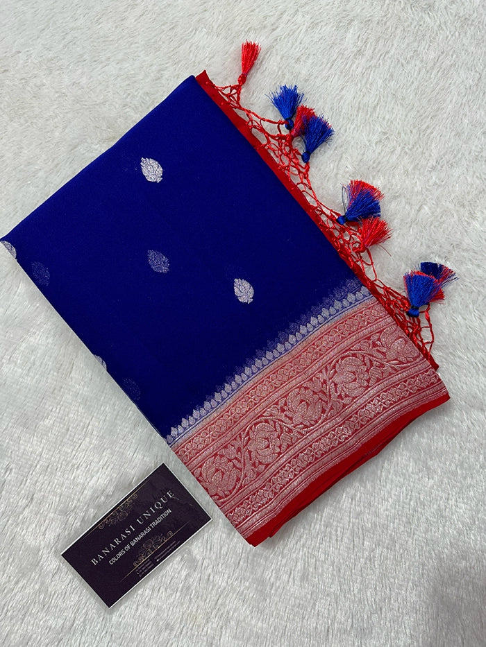 KHADDI CHIFFON SILVER ZARI KADHUWA SAREE - CONTRAST BORDER ROYAL BLUE WITH RED