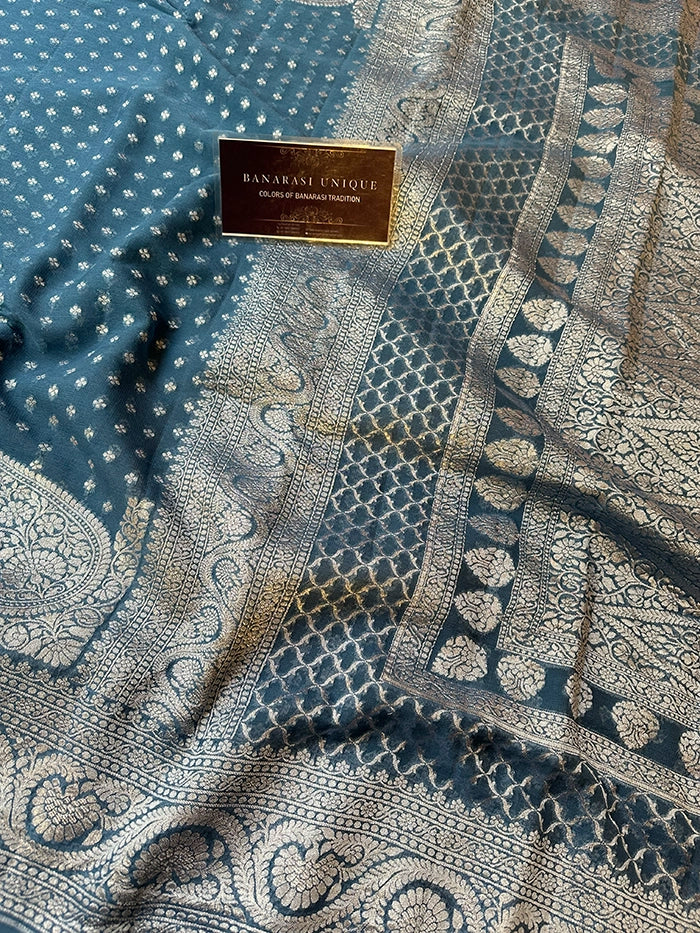 KHADDI GEORGETTE KONIA FOUR-PETAL BUTI SILVER ZARI SAREE - BERMUDA BLUE