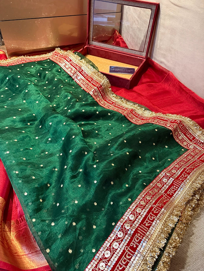SAUBHAGYAWATI HAND EMBROIDERED TISSUE SAREE - BOTTLE GREEN with RED BORDER